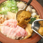 Menshubou Minowa - 鶏ガラスープで豚肉・肉団子・野菜などたくさんの具材を煮込み、特性かれールーを投入！