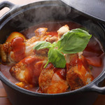 Chicken braised in red wine in a cast iron pot (serves 3-4)