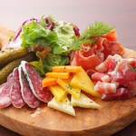 A luxurious assortment of Prosciutto and cheese