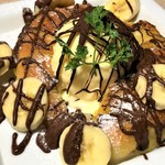Croissant French cuisine with melted chocolate banana (drink included)