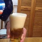 オリンピック - ドリンク写真:7分目くらいまで入ったら背中のボタンを押して神泡メーキング