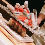 たかおか - タチウオのお寿司に上火をきかせています