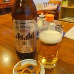 華勝園 - 大瓶ビールとお通しのメンマ