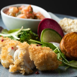 Fugu dishes arranged in various Japanese, Western, and Chinese styles