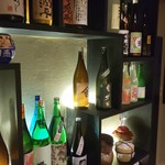 焼酎と肉 興 - 焼酎棚