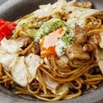 Street food stall-style yakisoba topped with warm egg
