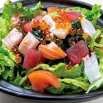 Seafood salad with fresh fish and salmon roe