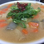 極楽うどん TKU - もつ煮込みあんかけうどん（中盛）（￥850）