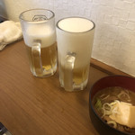 ギュートン軒 - 泡が多くてごめんね！で、もう一杯持って来てくれた