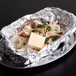 Grilled mushrooms in butter foil