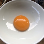 カフェアンドショップ ロータスランド - 生卵黄身
      2019/06/08 モーニングセット
      C set 卵かけご飯 380円
      100%オレンジジュース
