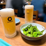 居酒屋鳥幸 - 生ビールとお通し
２杯目はホッピーにしました。