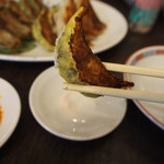 千日前 やすだや - 店主特製変り種餃子：ひじき餃子（皮：黄色）