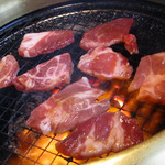 Gyuubee - イベリコ豚焼いてる最中。