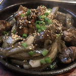 鉄鍋餃子 哲平 - 地鶏のコロコロ焼き