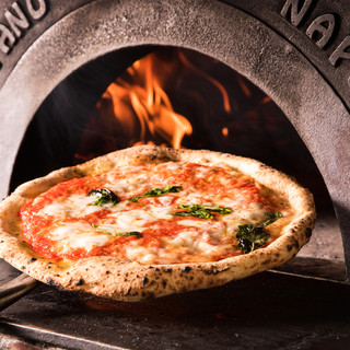 Piping hot pizza baked in a wood-fired oven!