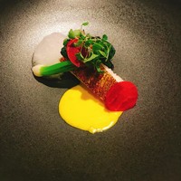 レザン ドール - 魚料理。
                    白味魚にまろやかなソースとカボスのムースを合わせています。