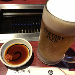 甲斐武 - 大ジョッキのビール