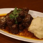 Beef simmered in red wine