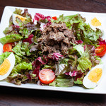 Special salad topped with Ogata Ranch corn beef
