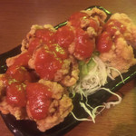Yasukichi - 鶏唐揚トマトガーリック¥500。ボリューミーで満足。
