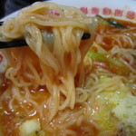 太陽のトマト麺 - トッピングのチーズが、麺と絡んでさらに濃厚に。