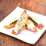 Prosciutto and avocado pizza toast