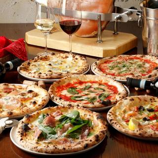 Authentic Neapolitan pizza baked in a stone oven by a pizza chef