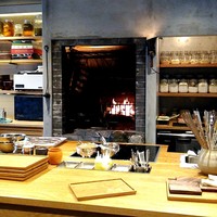 LURRA° - 炭焼き場。上に鱧も吊してある。