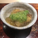 菊鮨 - 真蛸（志賀島）。真蛸と茄子に酢味の効いたジュレ。