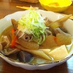居酒屋和みや - 料理写真:もつ煮　450円　自家製一味をかけるとかなりHOTです。