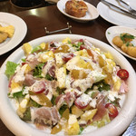 ラ ヴィゴーリア - パルマ産プロシュートと旬のフルーツのサラダ