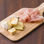 Light platter of Prosciutto and cheese