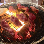 万正 - ヒモ焼き焼き風景