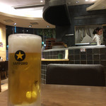 お台所ふらり - 炊飯中のかまど&チャーミングな女性店員