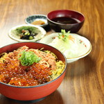 Exquisite Oyako-don (Chicken and egg bowl) with salmon and salmon roe