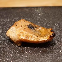 焼鶏 ひらこ - 首の皮　タレをタップリと