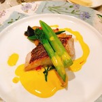 Oven-roasted red sea bream with saffron sauce