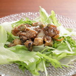 Green salad with carefully selected vegetables and edible dressing