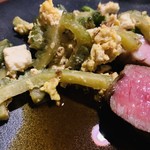 modest - 付け合せのゴーヤチャンプル的なもの。