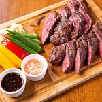 Fire-grilled hanger Steak with colorful vegetables