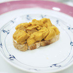 ペレグリーノ - 小さな逸品　長崎県　壱岐の赤ウニ、少し酸味の効いた　自家製ライ麦パンとの　クロスティーニ