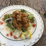 たけし亭 - 料理写真:サラダ鶏カラ乗せ。