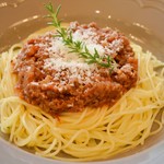 Homemade meat sauce pasta made with carefully selected meat, topped with soft cheese