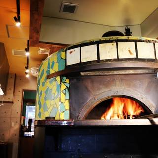 Our pride: Special pizza baked in a dome-shaped pizza oven