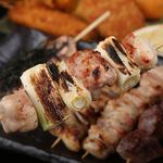 鉄鍋餃子  炭火焼鳥 もつ鍋  九州酒場  丸九 - 