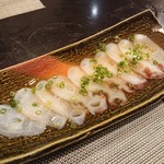 禅紫 - 活きタコ酒盗石焼き