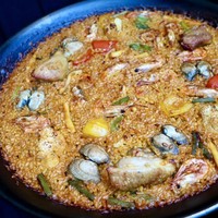 バル デ エスパーニャ ムイ 名古屋ミッドランド店 - 鶏肉と魚介のパエジャ 