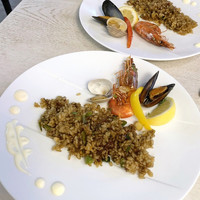 EX marunouchi - 魚介のパエリア（1,780円） 取り分け後