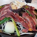 ツキサップじんぎすかんクラブ - 何度目かの焼き焼き(ニンニクの芽や焼きニンニクを注文)